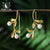 Karma Lotus Or & Perles blanches Boucles d'oreilles Hikali Karma Lotus Karma Lotus